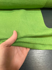 Up-Close Green Linen Fabric in Hand showing a more accurate color & weave 