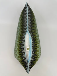A square decorative throw pillow with shades of green, and blue chevron pattern, shown open to reveal a white Pillow Insert interior and a light blue zipper and trim.