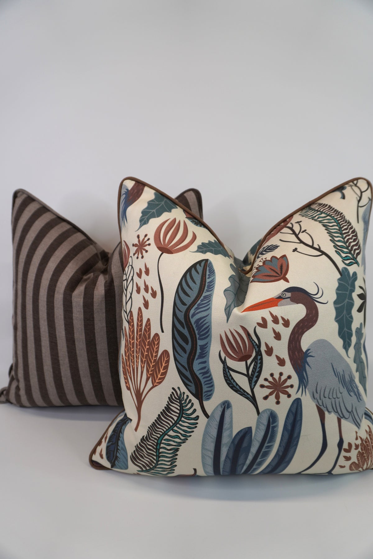 Everglades Heron in Plants Blue & Brown Fabric in a Decorative Pillow or Bolster