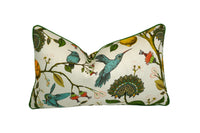 Decorative pillow with a teal hummingbird and floral pattern on a lemon tree on an Ivory-beige background in a lumbar style Pillow with Green Welt/Piping